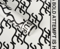 Упаковочный материал "Success", 10 листов, 65мкр. 58cm*58cm, белый с черным Упаковочный материал "Success", 10 листов, 65мкр. 58cm*58cm, белый с черным