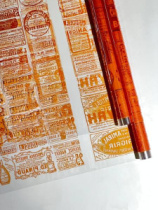 Пленка Газета винтажная оранжевая 70см*10ярд ± 5%