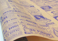 Крафт бумага "Винтажная газета" фиолетовая на коричневом фоне 70см/60гр/60мкр/10м± 5%